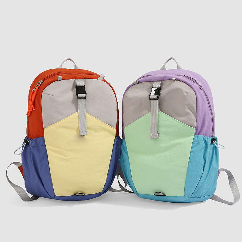 Unisex lightweight adventure backpack in vibrant colors. Perfect for travel, school, daily commute, and outdoor use.