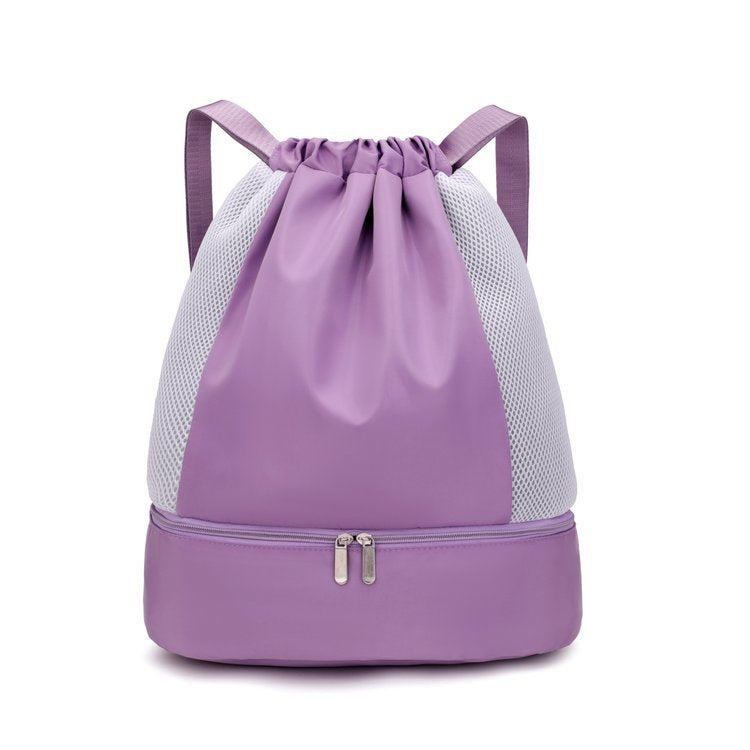 Unisex travel backpack with easy drawstring access & lightweight mesh construction.