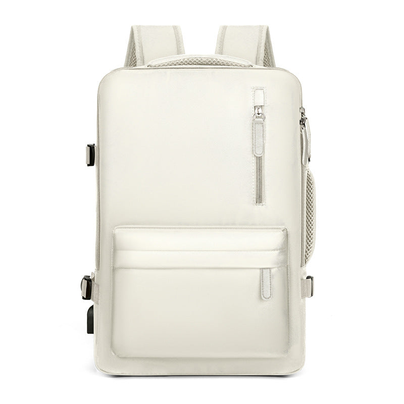Open view of a versatile multi-compartment backpack showing spacious interior for school books & travel essentials.