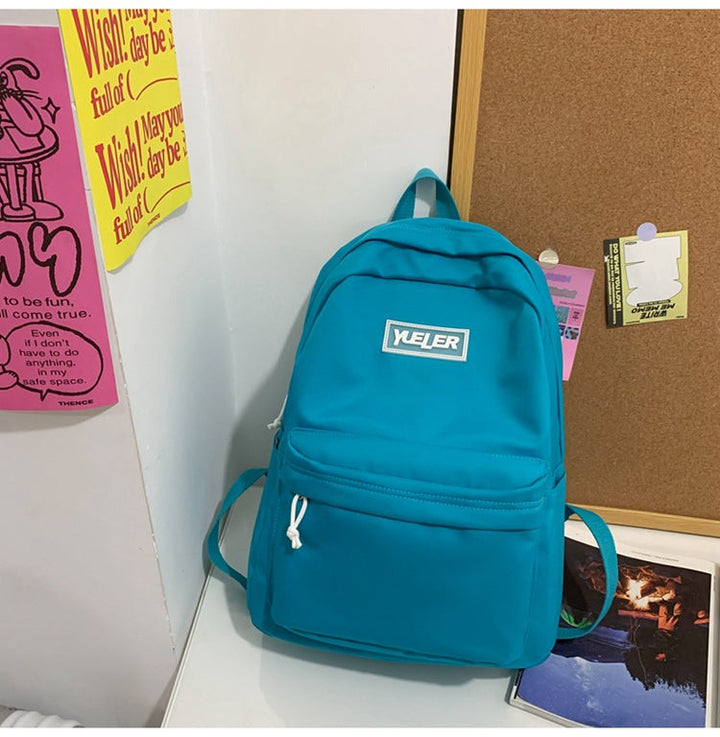 Durable water-resistant unisex backpack, perfect for travel, school, and daily carry, with multiple compartments.