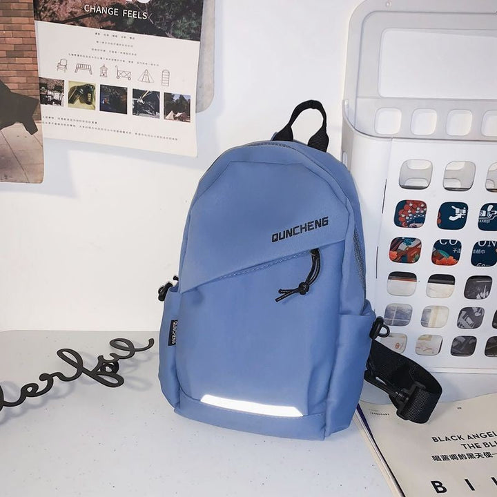 Front view of a sleek, waterproof unisex urban backpack, ideal for daily use, travel, and school. Modern minimalist.