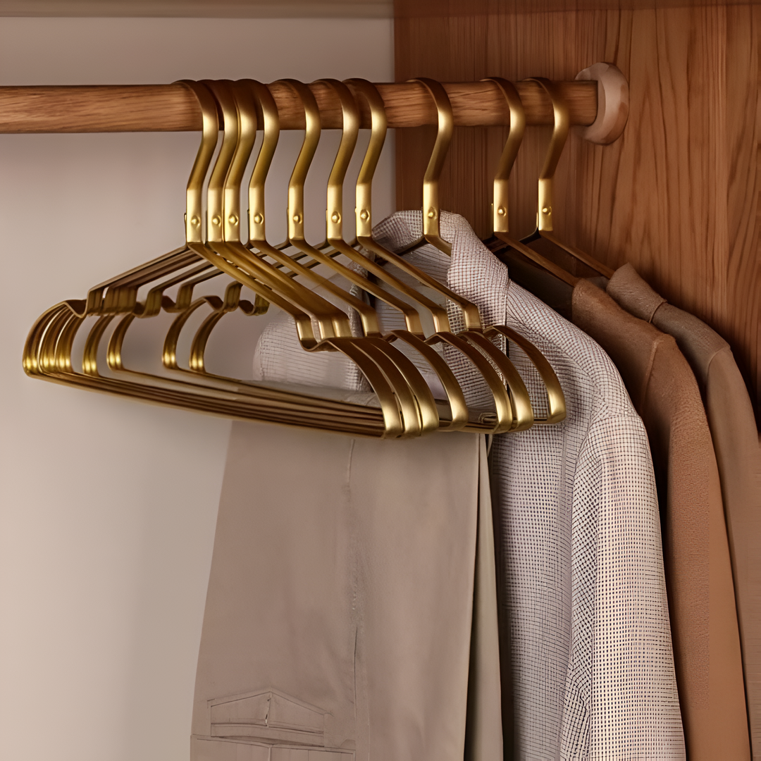 Plush velvet clothes hangers, anti-slip surface prevents garments from slipping, ideal for luxury garment care.