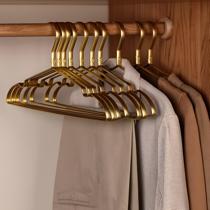 Plush velvet clothes hangers, anti-slip surface prevents garments from slipping, ideal for luxury garment care.