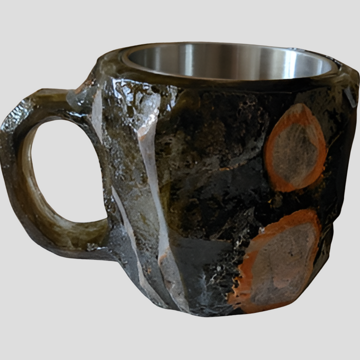 Interior of a stainless steel insulated mineral crystal coffee mug, ready for hot beverages.