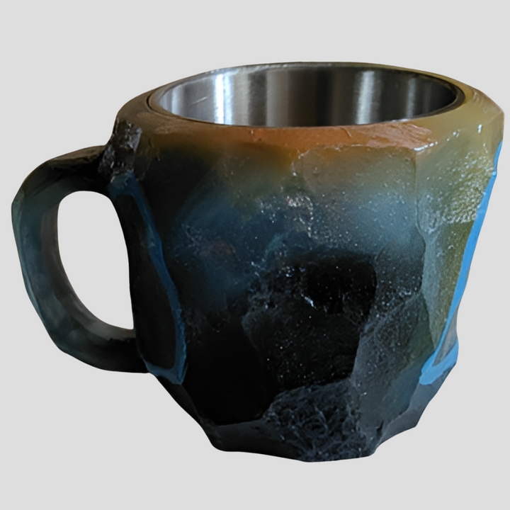 Close-up of sparkling star zircon design on a crystal coffee mug. Unique, elegant, and luxurious.