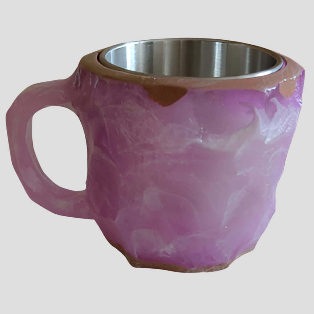 Hot coffee in a designer mineral crystal mug with star zircon. Perfect for luxurious morning rituals.