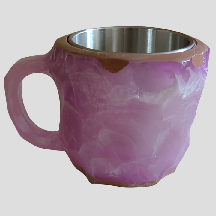 Hot coffee in a designer mineral crystal mug with star zircon. Perfect for luxurious morning rituals.