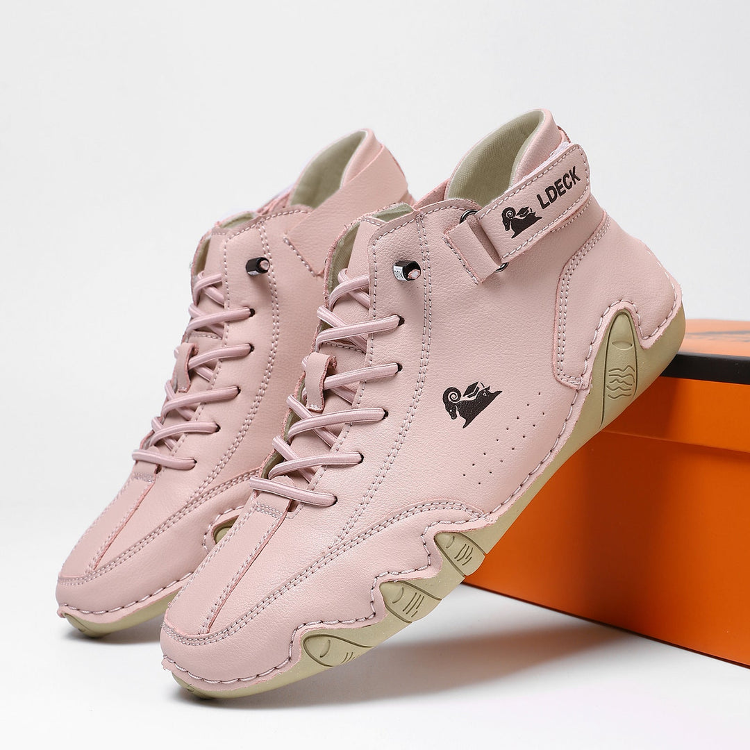 Barefoot shoes with a wide toe box & flexible sole, enhancing natural movement & foot health.