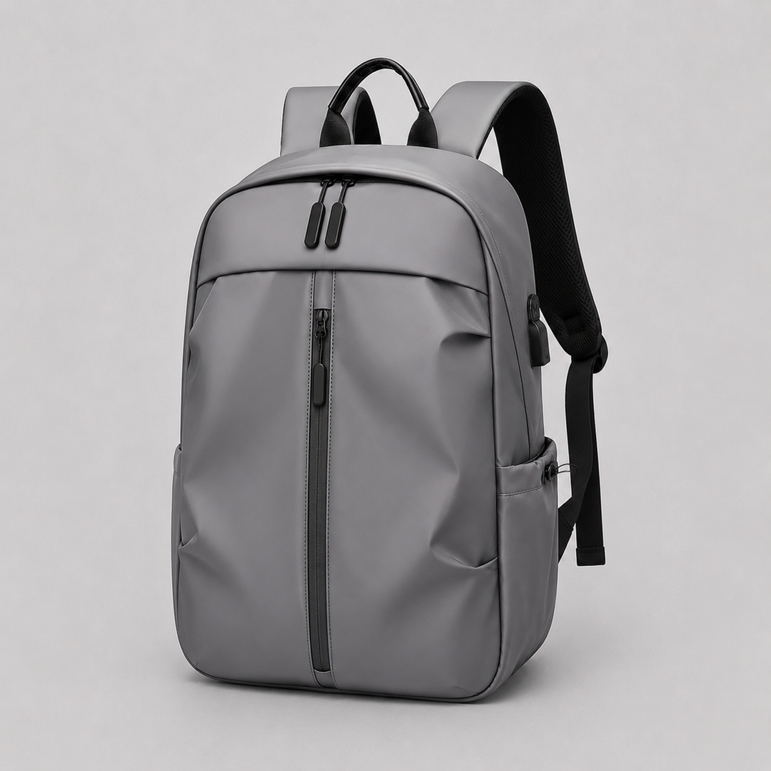 Versatile minimalist backpack with laptop compartment & USB port for charging. Ideal for travel or work.