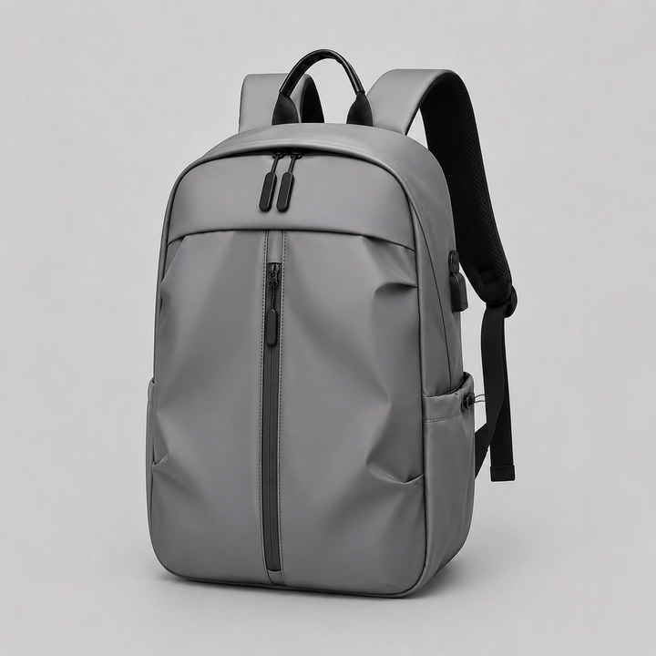 Versatile minimalist backpack with laptop compartment & USB port for charging. Ideal for travel or work.