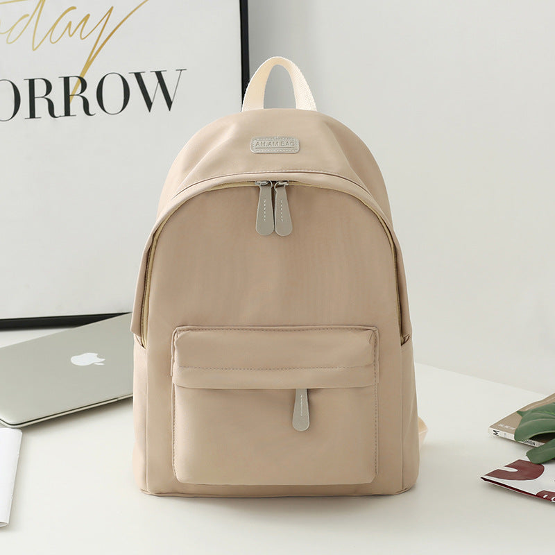 Versatile black minimalist bag, an excellent choice as a work bag, school bag, or travel companion.