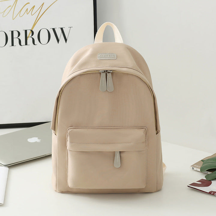 Versatile black minimalist bag, an excellent choice as a work bag, school bag, or travel companion.