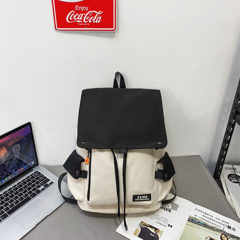 Sleek black minimalist laptop backpack, perfect for professionals & students. Durable work & travel bag.