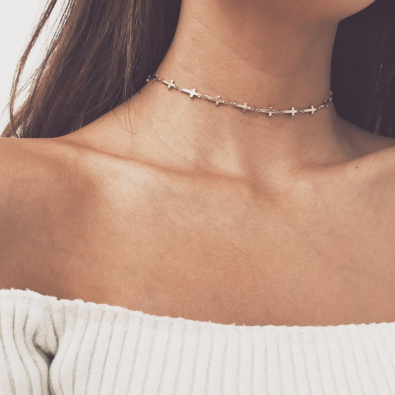 Unisex minimalist cross design stainless steel chain necklace. Elegant spiritual jewelry for everyday wear.