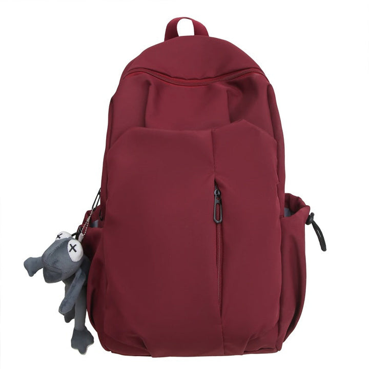 Unisex travel backpack, minimalist & water-resistant for daily use, school, work, & commute. Practical utility design.