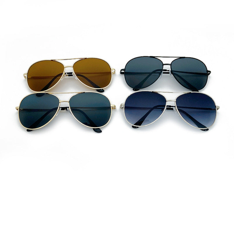 Trendy unisex pilot sunglasses, a modern fashion accessory. UV protection shades for summer style.