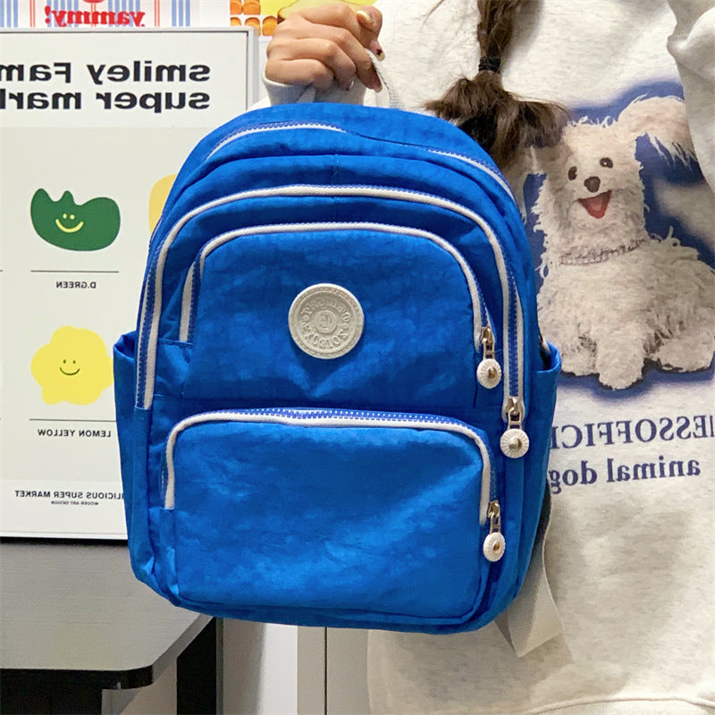 Unisex multi-functional everyday backpack for daily commute, school, work, and travel. Durable & organized design.