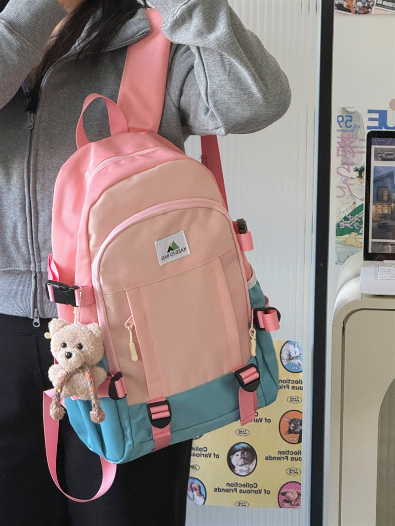 Unisex multi-functional school backpack, durable black canvas, multiple compartments for students & everyday travel.