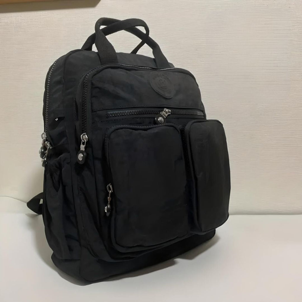 Unisex multi-pocket commuter backpack, durable water-resistant for daily essentials, travel, and school.