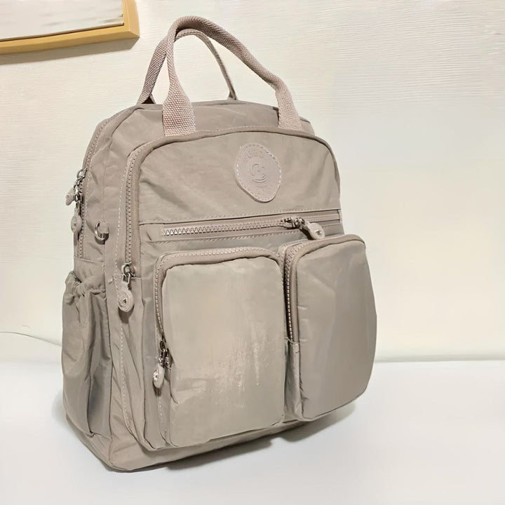 Organized unisex multi-pocket backpack with multiple compartments, perfect for daily commute, school, work & travel.