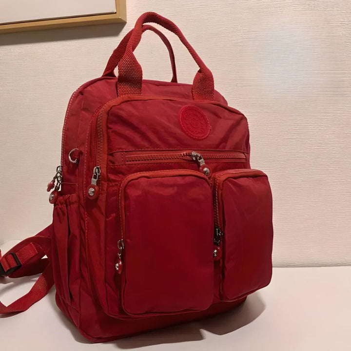Stylish unisex multi-pocket commuter backpack, a fashionable everyday bag for work, school, travel & organization.