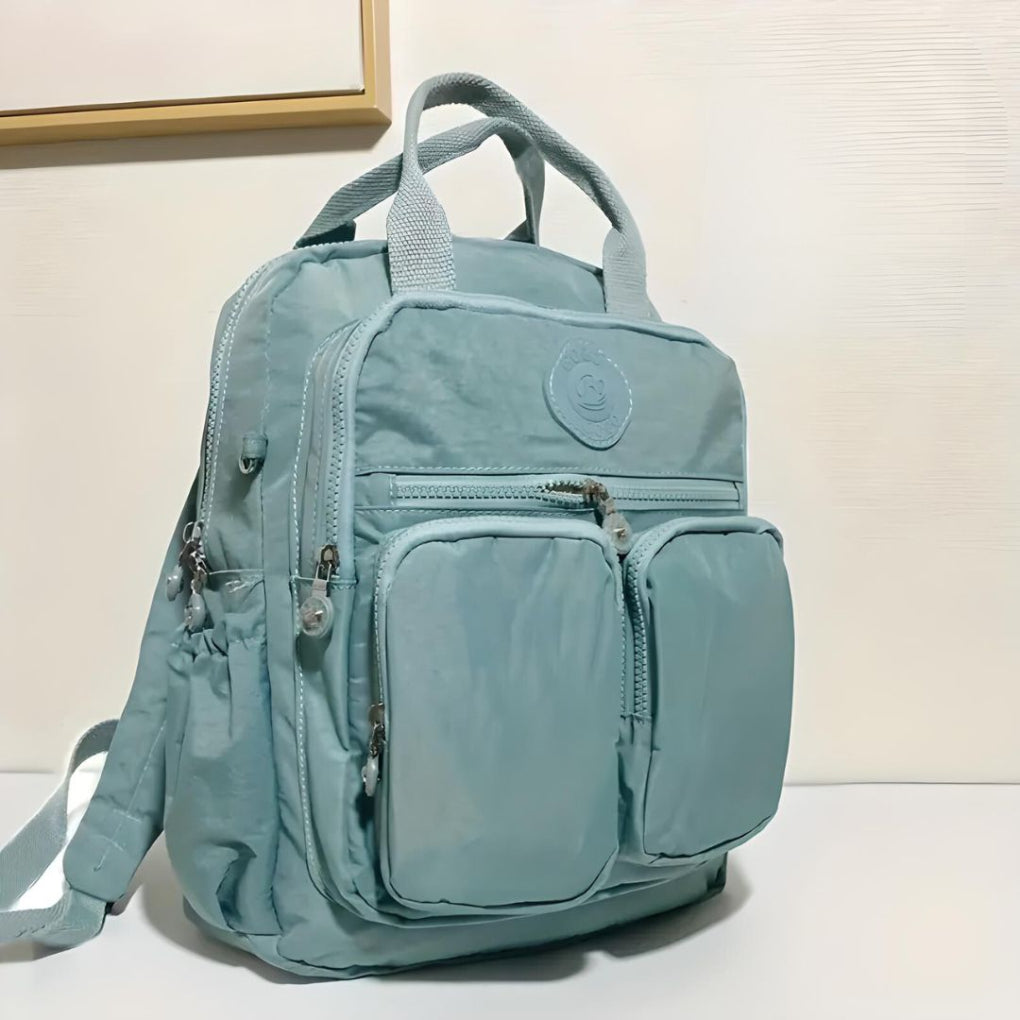 Versatile unisex multi-pocket backpack for commuters, students, and travelers, great for daily essentials.