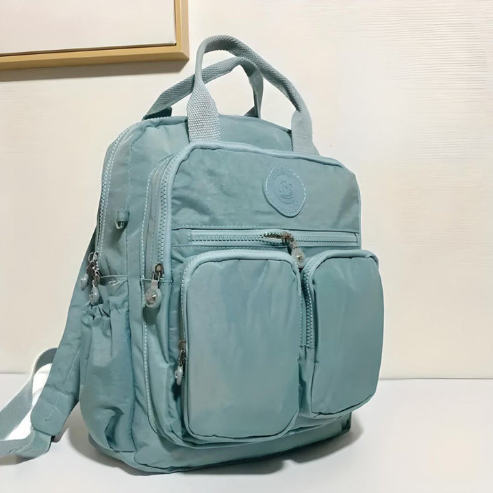Versatile unisex multi-pocket backpack for commuters, students, and travelers, great for daily essentials.