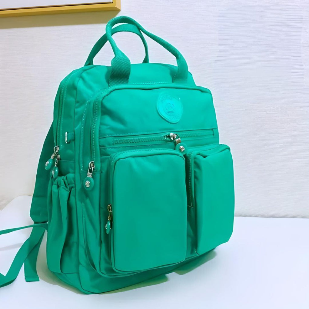 Unisex multi-pocket commuter backpack, ideal for carrying daily essentials, travel gear, school supplies.