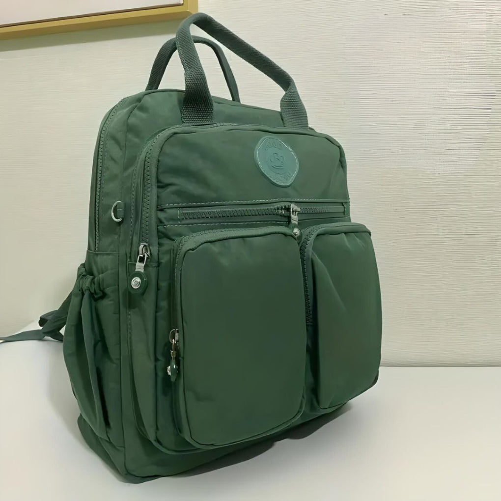 New unisex multi-pocket commuter backpack, durable & water-resistant, perfect for everyday organization & travel.