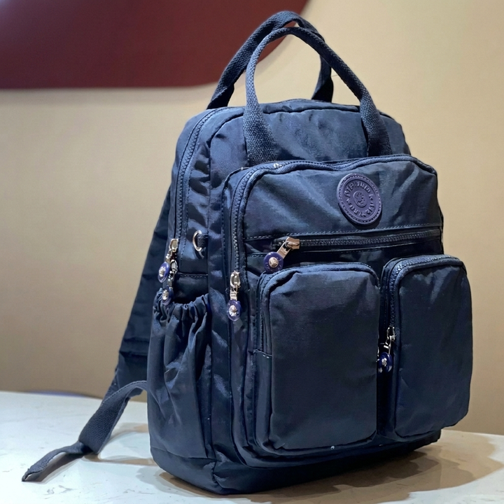 Stay organized with this durable, water-resistant unisex multi-pocket commuter backpack for school, work or travel.