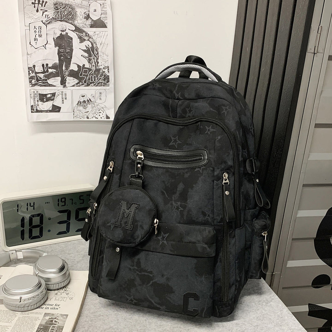 Unisex multi-pocket daily carry backpack in black, durable for school, travel & work. Versatile design.
