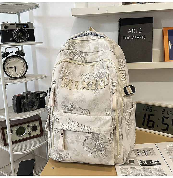 Unisex multi-pocket school backpack with stylish graphic print for students. Durable and versatile for daily use.