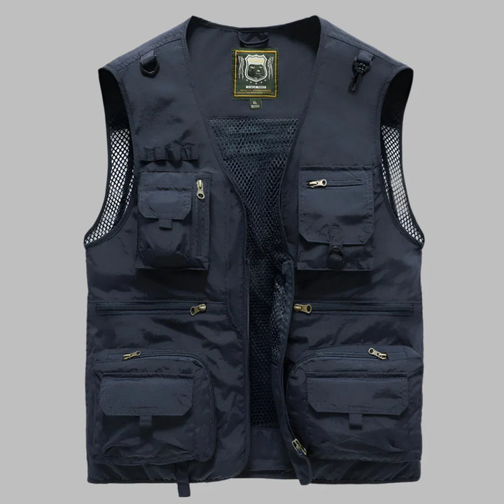 Army green multi-pocket summer vest, lightweight, breathable, utility outerwear for photographers, anglers, travelers.