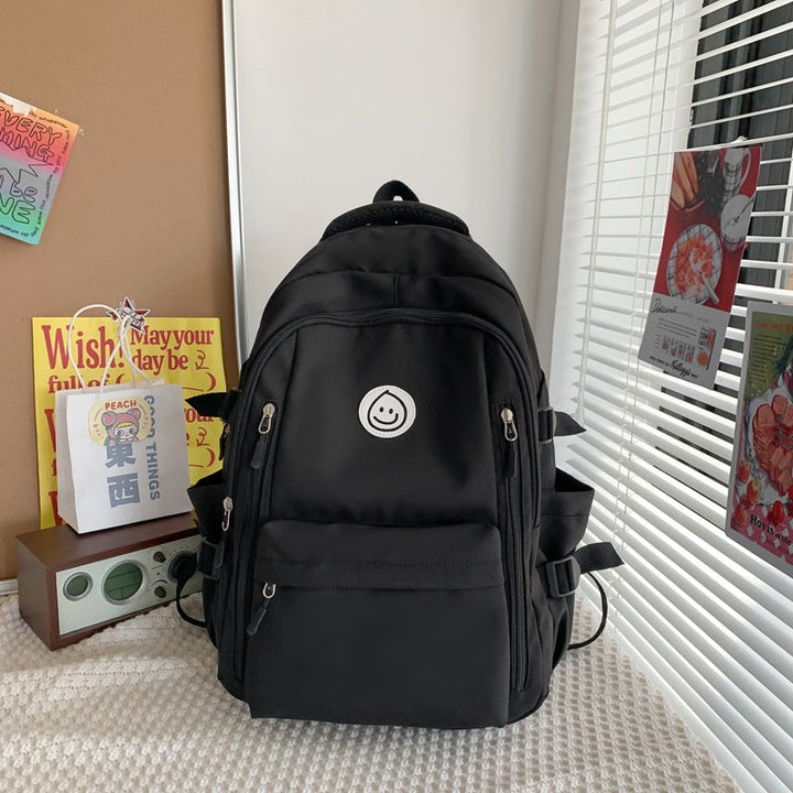 Organized multi-compartment unisex backpack. Spacious pockets for laptop, books & essentials. Perfect daypack.