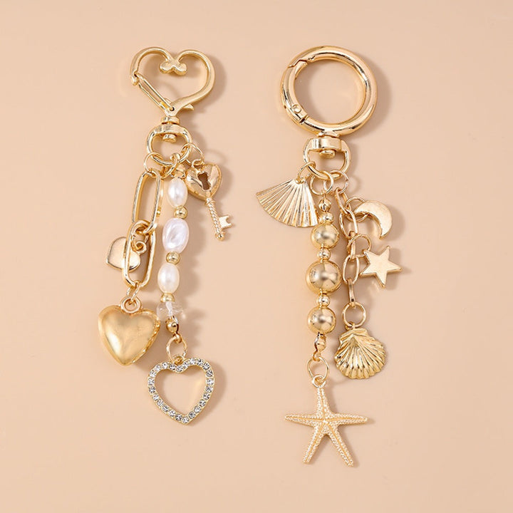 Unisex nautical charm keychain with anchor and ship wheel, a durable maritime accessory for keys.