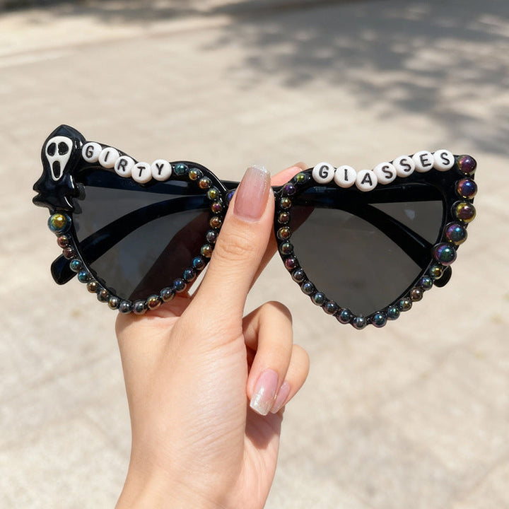 Unisex novelty cat-eye sunglasses for parties & festivals. Stylish eyewear with UV protection for a fun fashion statement.