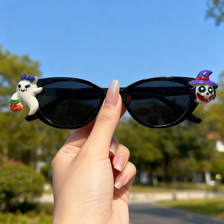 Close-up of stylish cat-eye novelty sunglasses, showcasing unique frame design & high-quality construction. Unisex fashion.