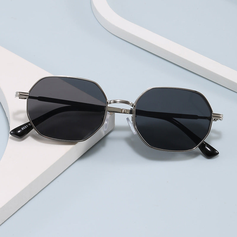 Unisex octagonal sunglasses with full UV protection, trendy metal frame.
