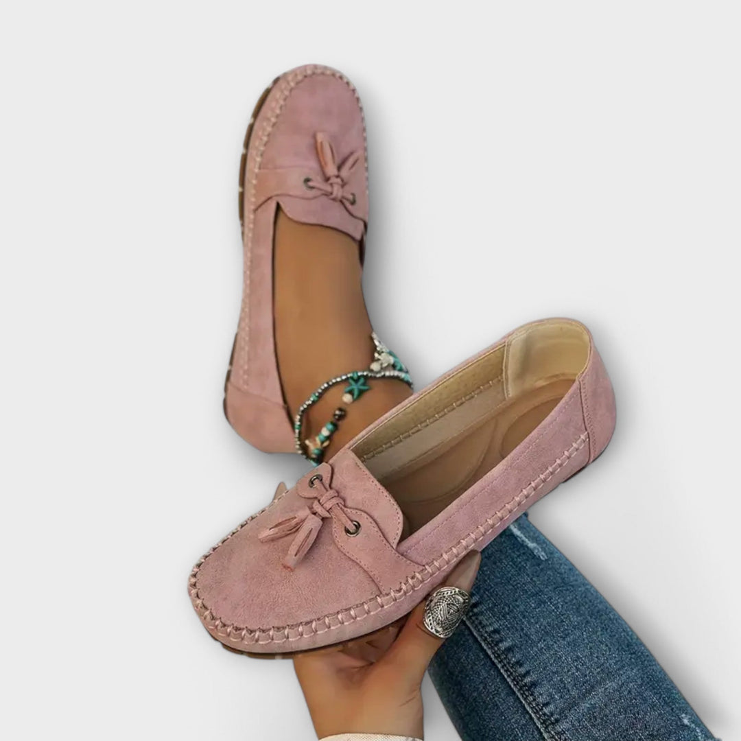 Comfortable unisex loafers with arch support & cushioned sole for ergonomic foot pain relief. Easy-wear casual slip-ons.