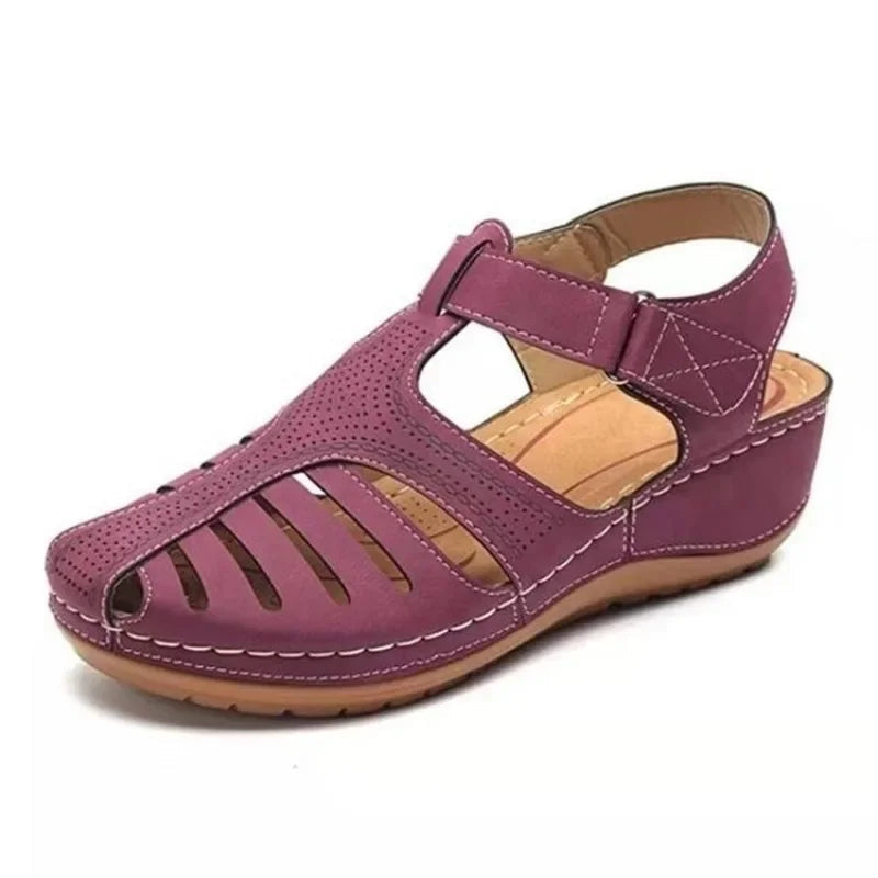 Comfortable unisex orthopedic sandals providing arch support & foot pain relief. Ergonomic design for supportive daily walking.