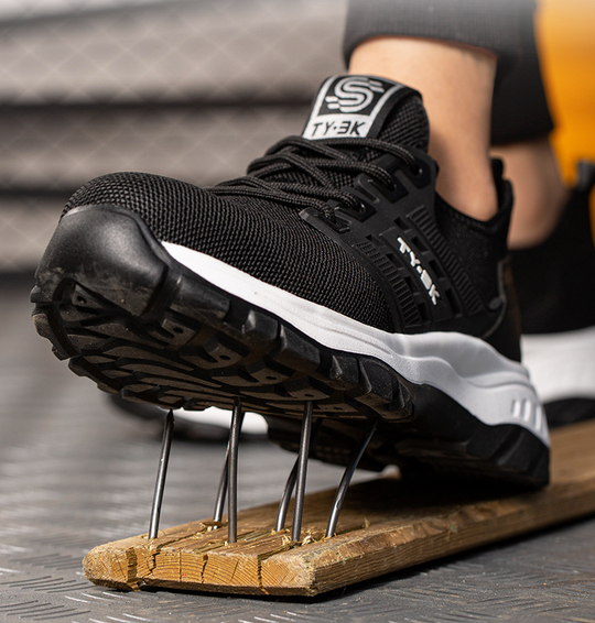 Industrial safety work shoes with superior foot support, ideal for job site protection.