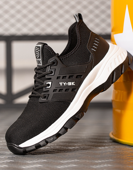 Comfortable orthopedic safety shoes, slip-resistant for unisex job site protection.