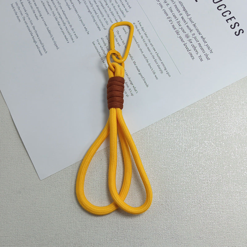 Practical paracord keychain, a must-have utility tool for outdoor adventure & survival kits.