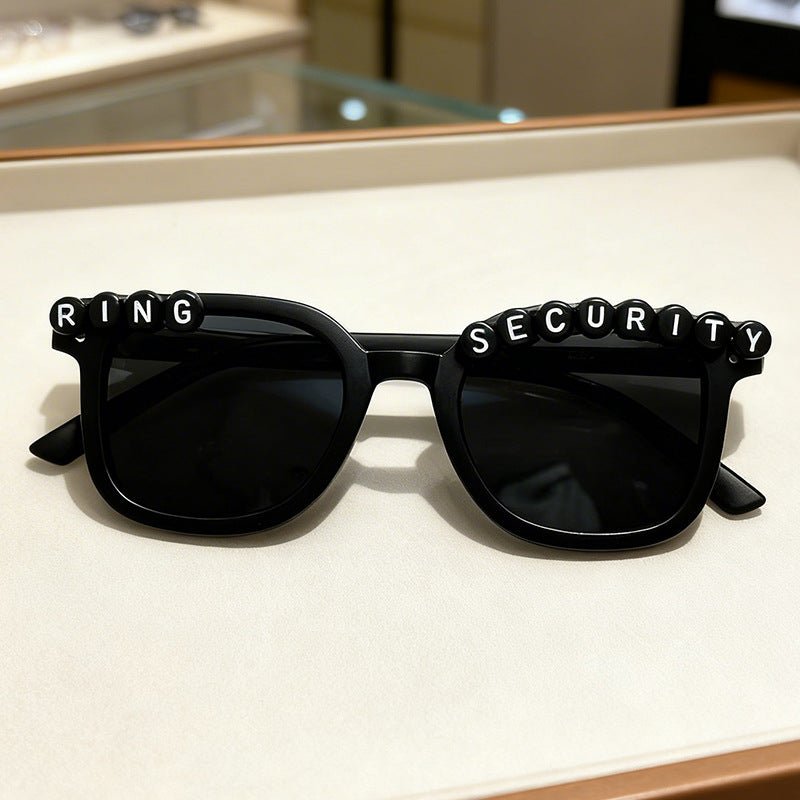 Bold oversized square graphic sunglasses, unisex UV protection eyewear for a trendy fashion statement.
