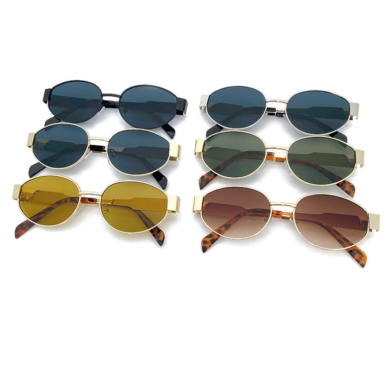 Unisex oversized metal frame sunglasses offering UV protection. Stylish fashion eyewear for summer.