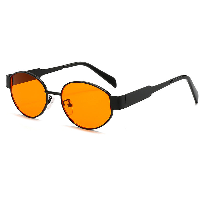 Side view of chic oversized metal frame sunglasses. Fashion eyewear with full UV protection.