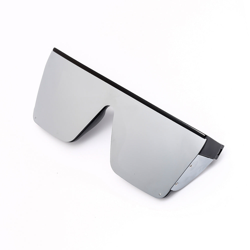 Trendy oversized sunglasses with UV protection, perfect for summer beach days.