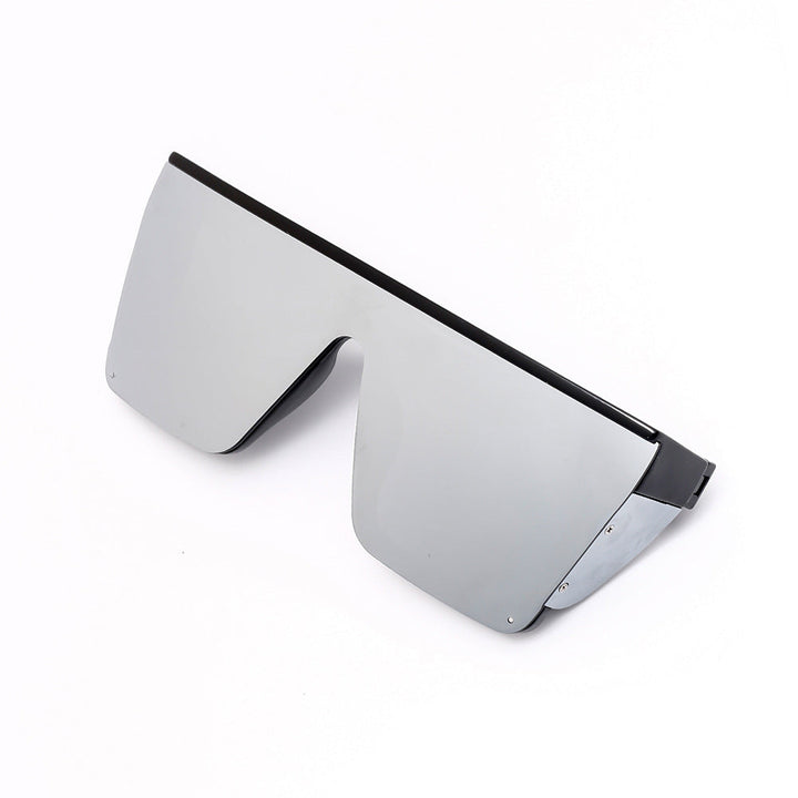Trendy oversized sunglasses with UV protection, perfect for summer beach days.