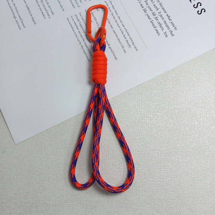 Secure paracord survival keychain with carabiner, keeps your essentials safe outdoors.