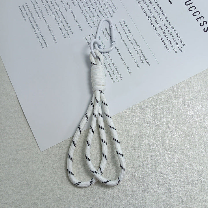 Multi-functional paracord utility keychain for camping, hiking & everyday carry gear.